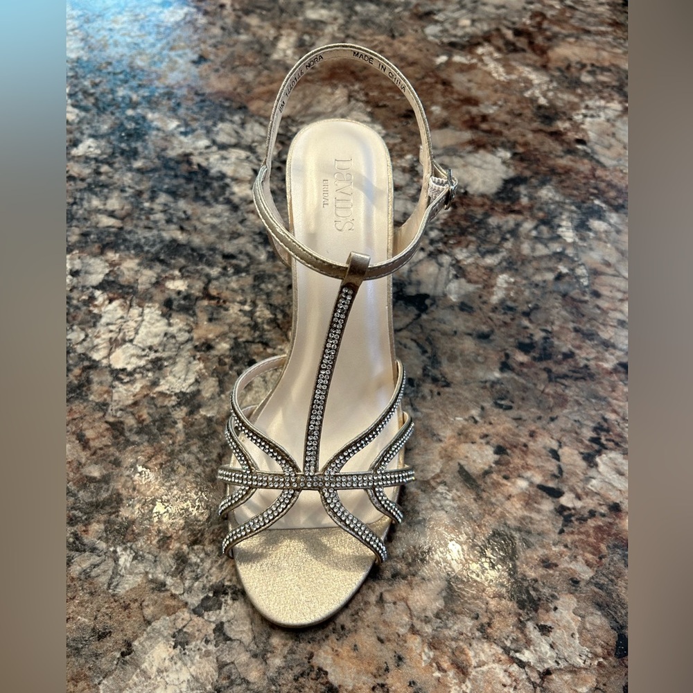 Dressy gold wedge shoes with rhinestone straps. New in box.